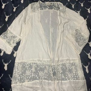 It’s a white cami boho style very cute never worn.